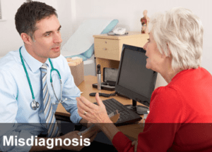 A patient discussing medical misdiagnosis with a doctor. A caption at the bottom of the photo reads "misdiagnosis".