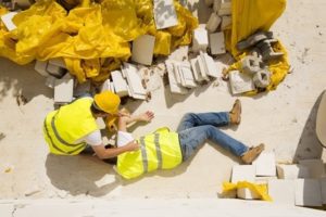 Man who has fallen down on a construction site