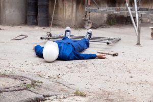 Man fallen off a ladder at a construction site