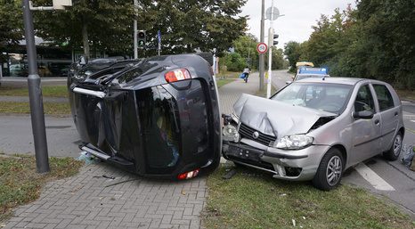 Two damaged cars involved in a high speed car accident
