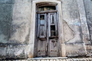 Doors to a place falling into disrepair following landlord negligence