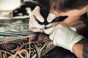 tattoo injury claim