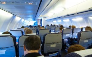 People sat down on a plane about to take off