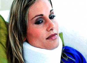 Woman recovering from whiplash injury wearing a neck collar