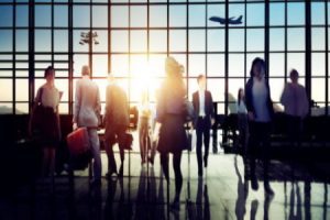 People gathered at Heathrow Airport waiting for their plane