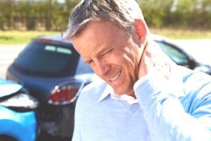 Man getting whiplash after getting rear ended which aggravated a pre-existing condition