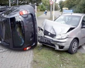 Two cars following a crash. 