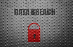An image of a red padlock and the words 'data breach' written on a grey background.