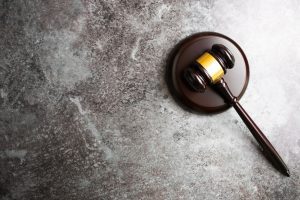 Judge's gavel on concrete