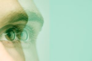 A person's eye which has been blurred and copied to give off a dizzy feeling