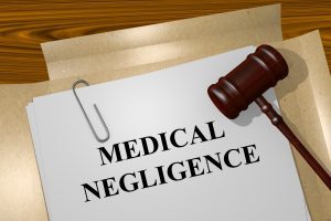 Render illustration of Medical Negligence title on Legal Documents.