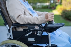 A woman uses a wheelchair after a serious case of clinical negligence.