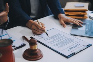 A solicitor helps a client with their claim
